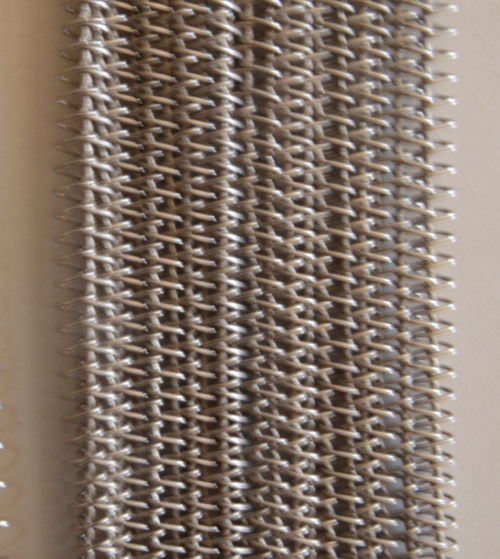 Lưới băng tải inox chạy cong
